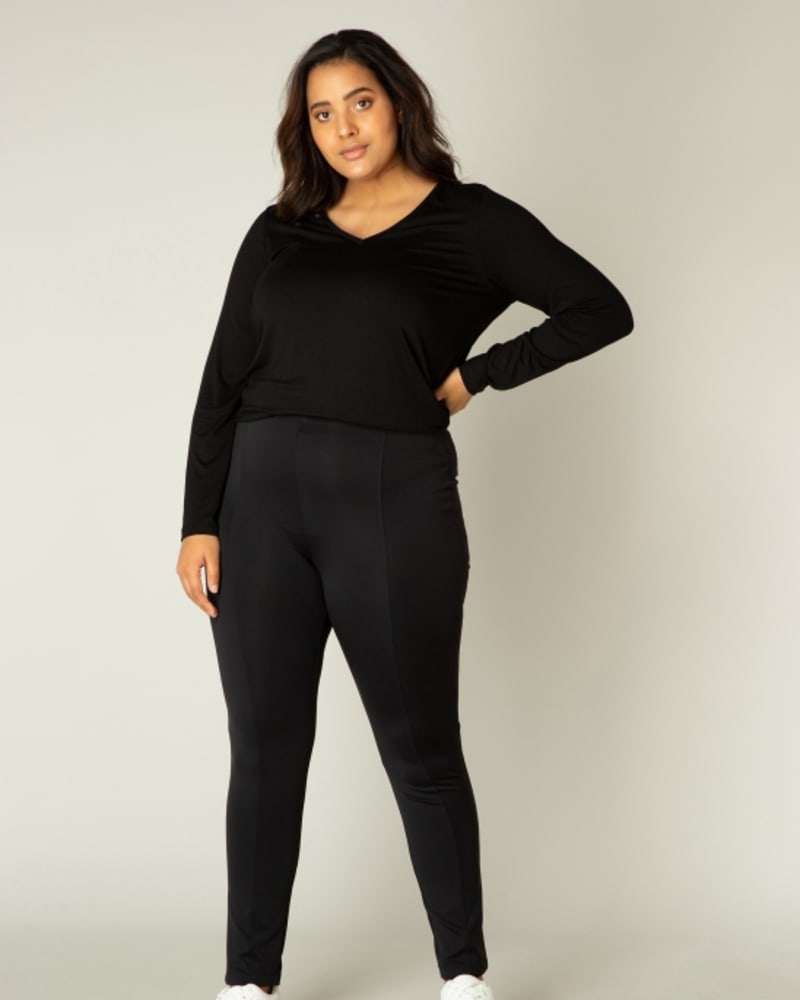 Front of a model wearing a size 2(50) Ada in Black by Base Level Curvy. | dia_product_style_image_id:253132